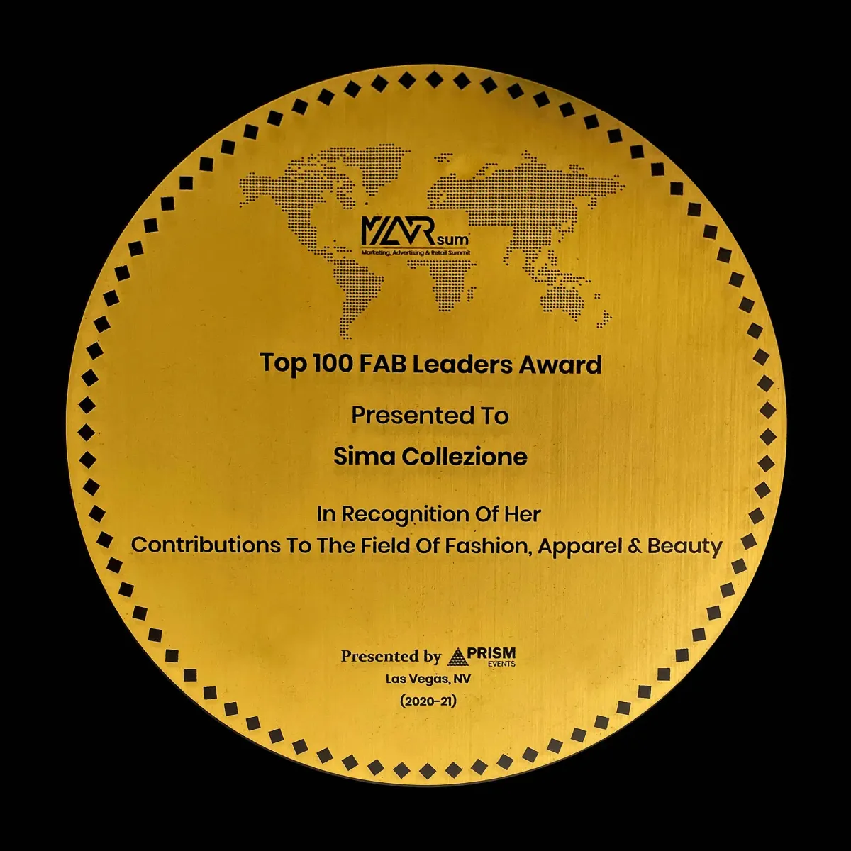 Circular gold Top 100 FAB Leaders Award presented to Sima Collezione